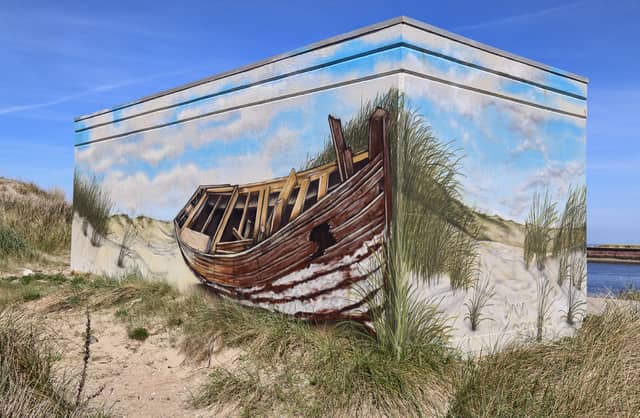 Untitled (wooden boat on sandy beach), photo from the city's open data