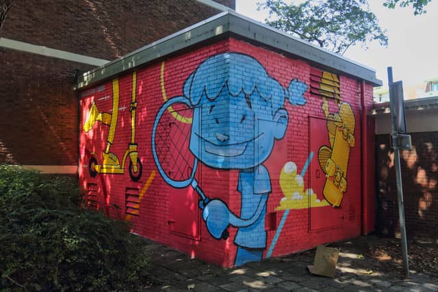 Untitled (blue child playing with yellow toys), photo from the city's open data