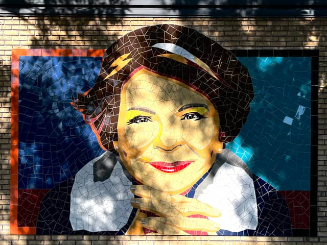 Untitled (portrait of a smiling woman with hat), photo from the city's open data
