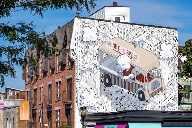 Untitled (child driving red and blue truck), Montreal